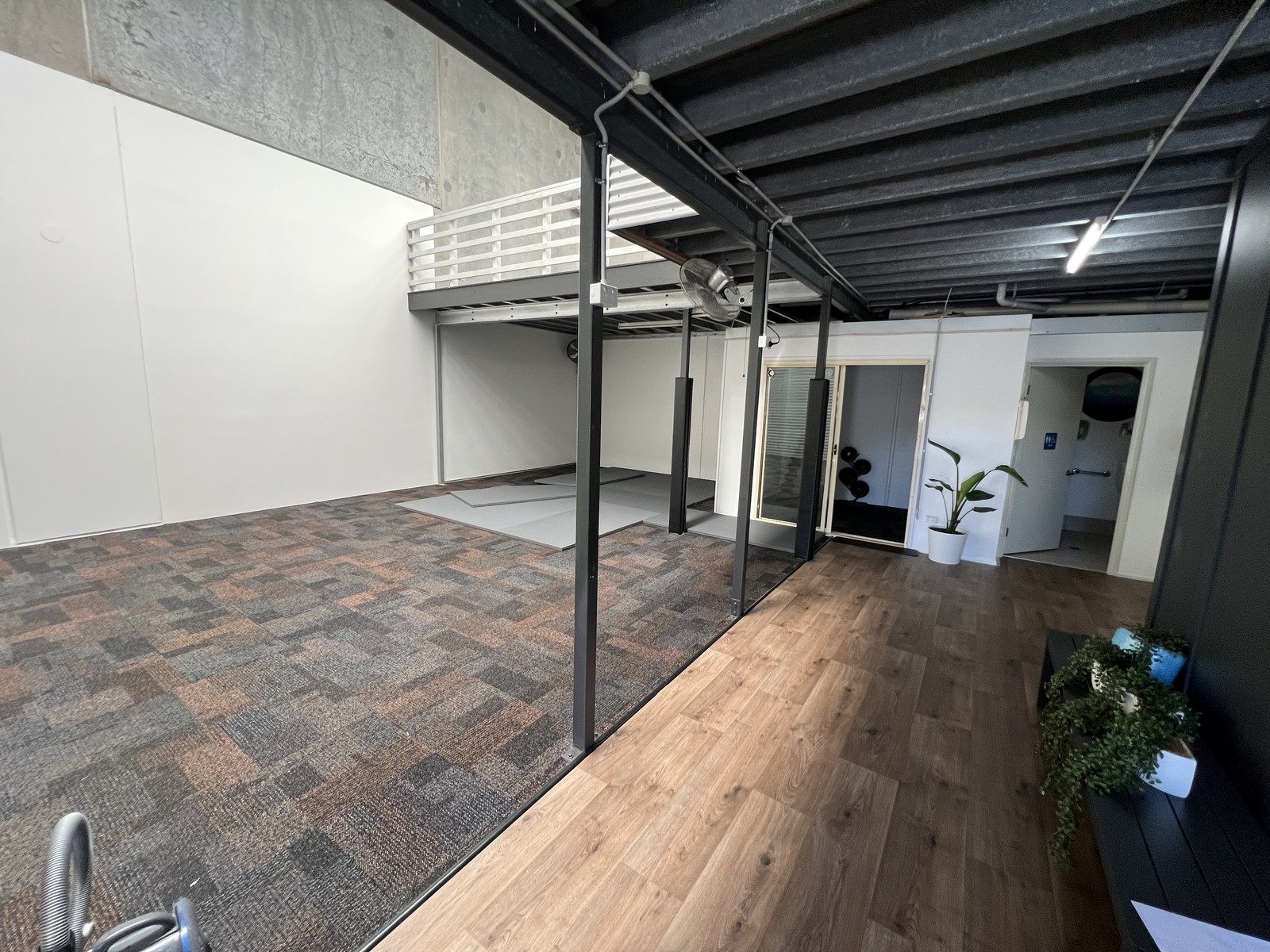 Finished industrial office and gym fit-out with mezzanine and lighting